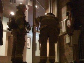 Firemen getting in the apartment.jpg